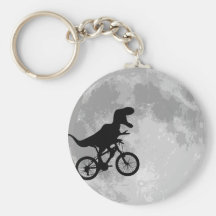 Dinosaurio en una bici en cielo con la luna llaveros