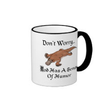 Dios tiene un sentido del humor Platypus Taza De Café