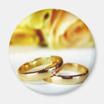Dos anillos de bodas del oro imán de frigorífico