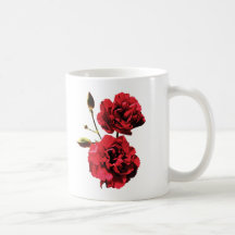 Dos claveles rojos con los brotes tazas