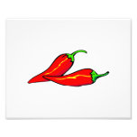 Dos pimientas de chile rojo en lado fotografias