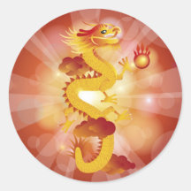Dragón chino feliz con el pegatina de la bola de f