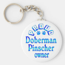 Dueño del Pinscher del Doberman Llavero