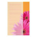 Efectos de escritorio anaranjados y rosados de la  papelería