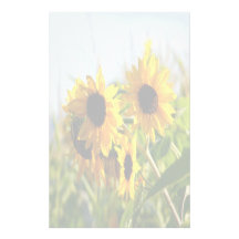 Efectos de escritorio descolorados de los girasole papeleria de diseño