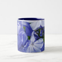 El azul florece la taza del arte