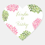 El corazón rosado y verde florece sello del pegati