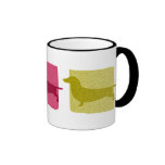 El Dachshund colorido siluetea la taza