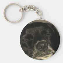 El dormir del perro negro llaveros personalizados