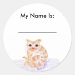 El gato anaranjado, mi nombre es: , ___________ etiqueta