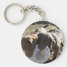 El jugar de los perritos llavero personalizado