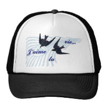 El la de J'aime compite gorras