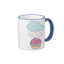El llover asperja en la magdalena tazas