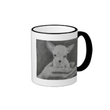 En la palma de su taza de las manos