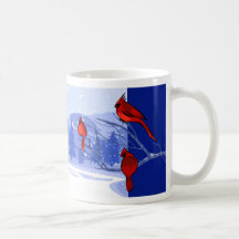 Escena de la nieve con los cardenales rojos. Taza 