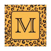 Estampado leopardo negro y anaranjado. Monograma d Lona Estirada Galerías