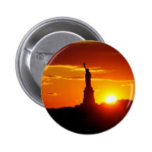 Estatua de la libertad en la puesta del sol pins