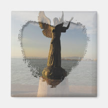 Estatua del ángel de ASAS en la puesta del sol Iman De Nevera