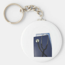 estetoscopio médico en carpeta azul llaveros personalizados