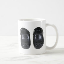 Estorbos negros del caucho tazas