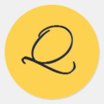 Etiqueta de la inicial de Q