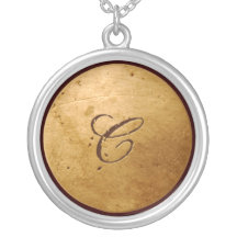 Falso collar del monograma "C" del oro