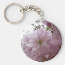 Flor púrpura brillante del árbol floreciente en ár llaveros personalizados