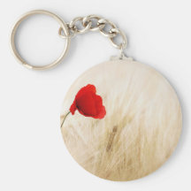 Flor roja en campo llaveros personalizados