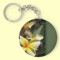 Flor tropical amarilla del plumeria llaveros