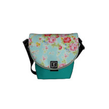 Flores color de rosa elegantes lamentables azules  bolsas messenger