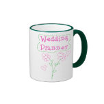 Flores rosadas que casan al planificador tazas