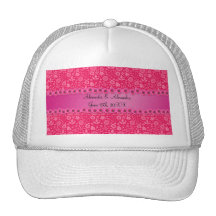 Flores rosadas que casan favores gorras de camionero