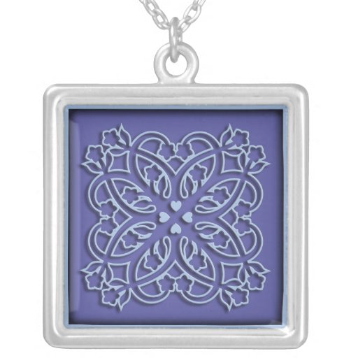Flores y ornamento del azul de los corazones collares