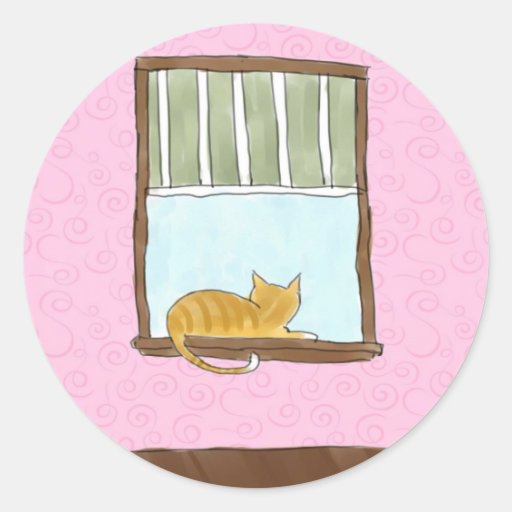 Gatito amarillo en pegatinas de una ventana