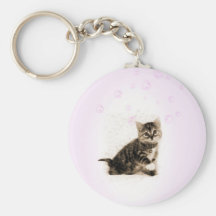 GATITO QUE JUEGA CON EL LLAVERO DE LAS BURBUJAS
