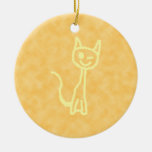 Gato amarillo, guiñando. Fondo amarillo del modelo Adorno De Navidad