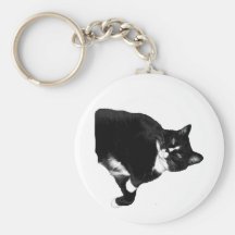 Gato blanco y negro que mira para arriba el recort llaveros