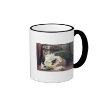Gato con sus gatitos en un amortiguador tazas de café