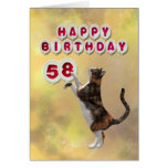 Gato juguetón y 58.os globos del feliz cumpleaños felicitacion 