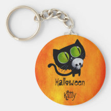 Gato negro de Halloween con el cráneo Llavero