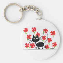 Gato negro del dibujo animado y flores rojas llavero