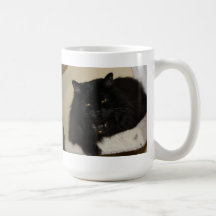 Gato negro hermoso taza