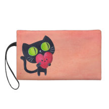 Gato romántico que abraza el corazón lindo rojo