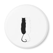 Gatos del ébano y de la marfil imanes