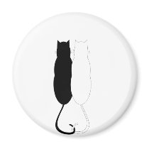 Gatos del ébano y de la marfil imanes