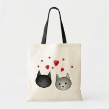 Gatos negros y grises lindos, con los corazones bolsa