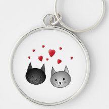 Gatos negros y grises lindos, con los corazones llaveros