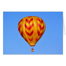 Globo del aire caliente del naranja y del oro tarjeton