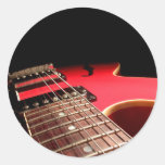 Guitarra eléctrica roja pegatina redonda