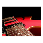 Guitarra eléctrica roja postal